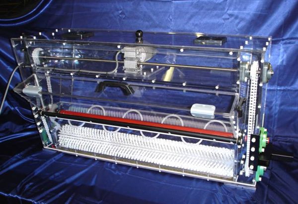 Single brush hopper as part of a modular flocking process