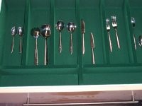 Flocking shown applied to inside of a cutlery drawer