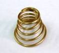 Spare battery retaining spring