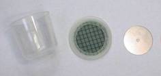 Small round 0.25 ltr pot complete with connector, charging plate and fine mesh for flock spraying equipment