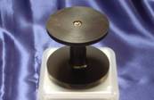 Adaptor to fit 100mm and 125mm applicator pots to 75mm applicator handle
